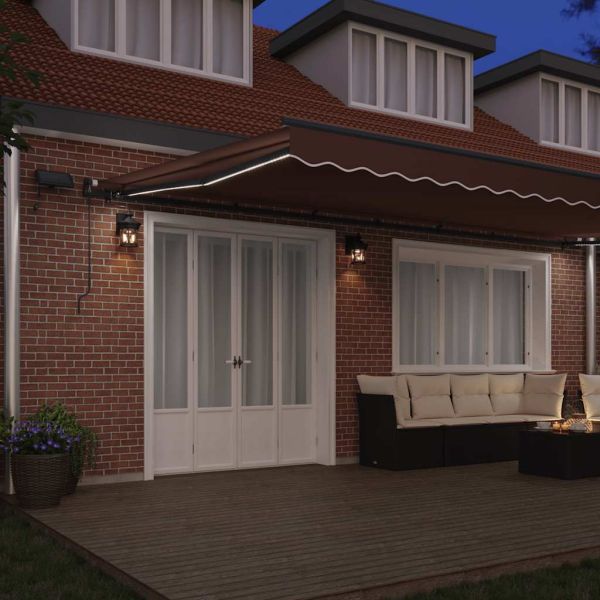 Ръчно прибираща се тента с LED, кафяв, 600x300 см