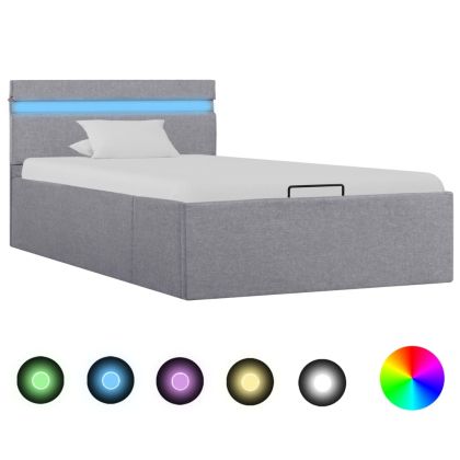 Легло с повдигащ механизъм и LED светлосиво текстил 100x200 см