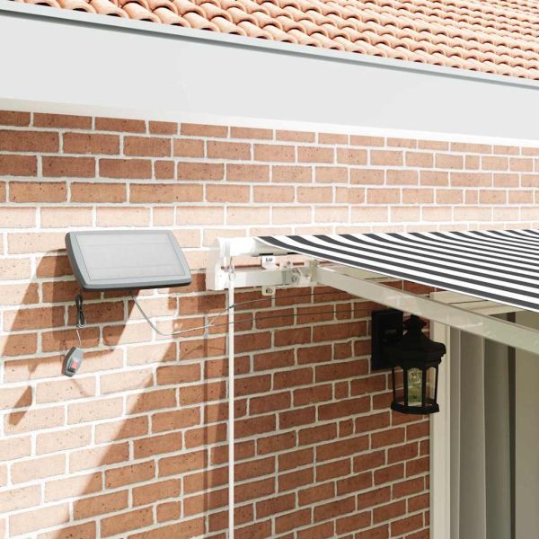 Ръчно прибираща се тента с LED, антрацит и бял, 450x300 см